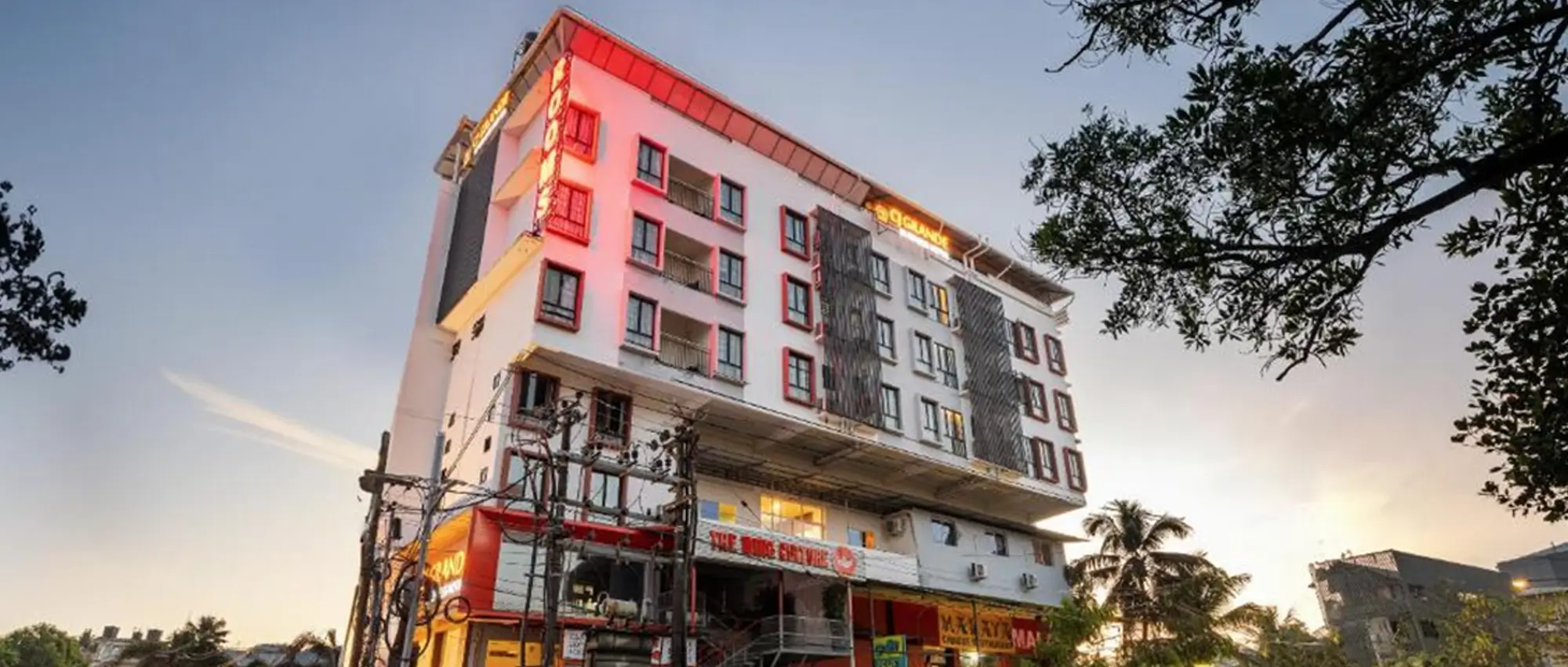 CJ Grande by Sterling Hotels & Resorts Exterior at Dusk